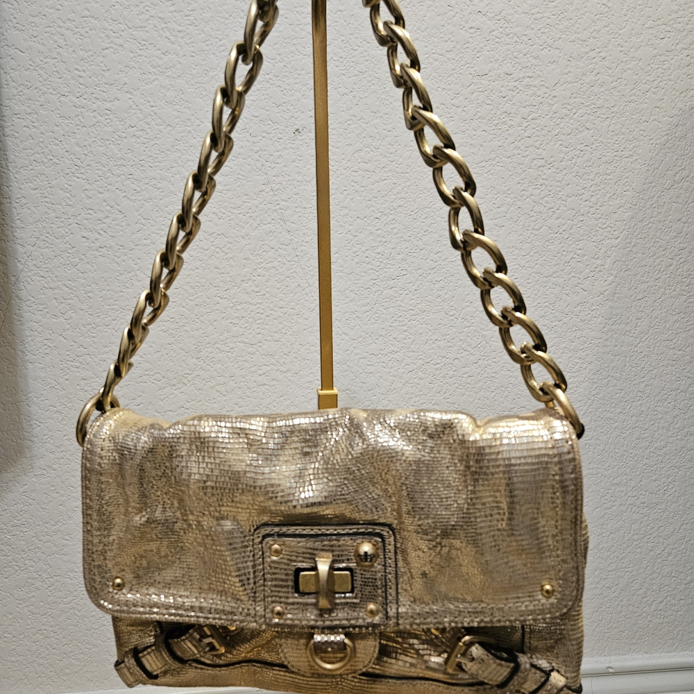 Juicy Couture Gold snakeskin-embossed shoulder bag featuring a chunky gold chain